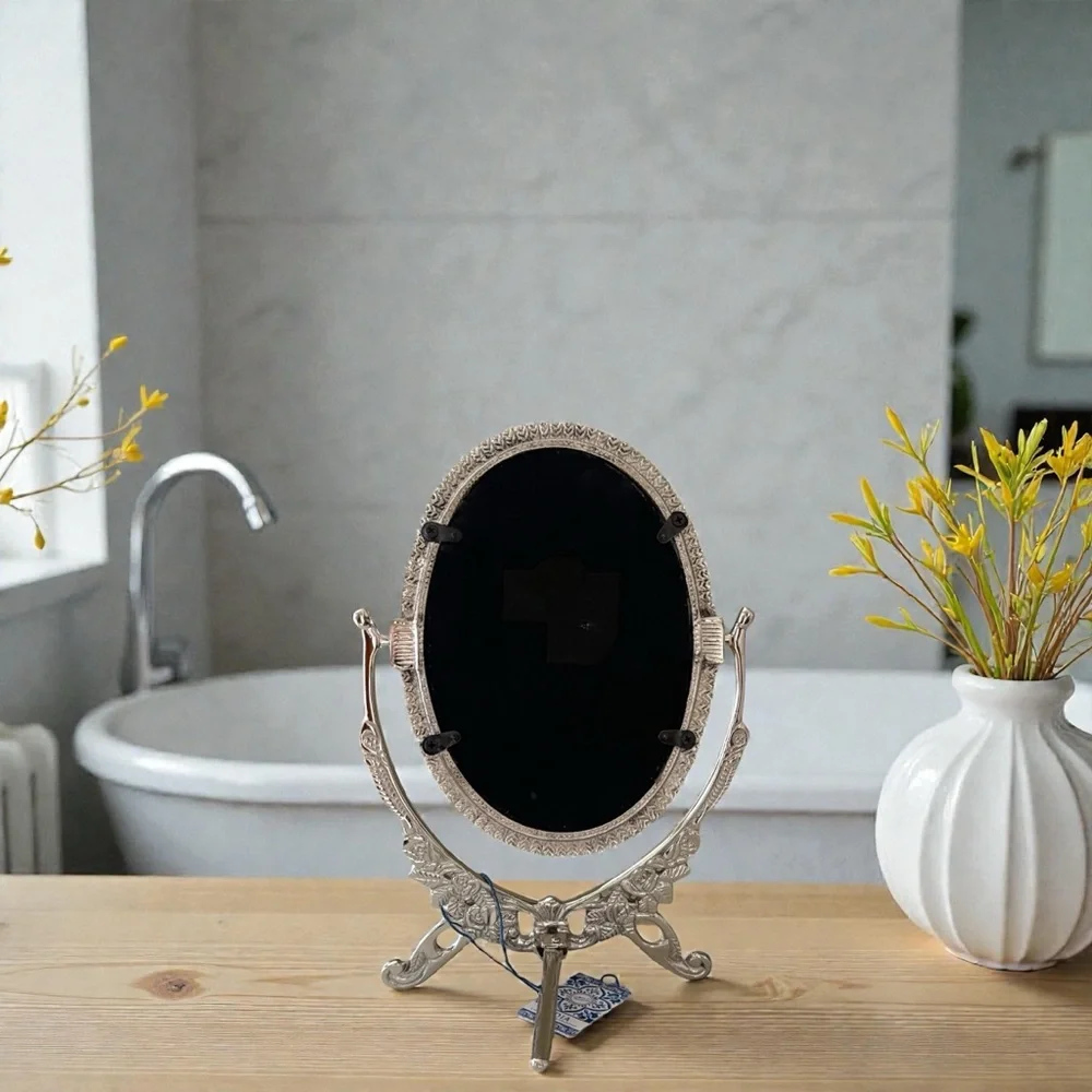 Ornate Silver Swivel Vanity Mirror